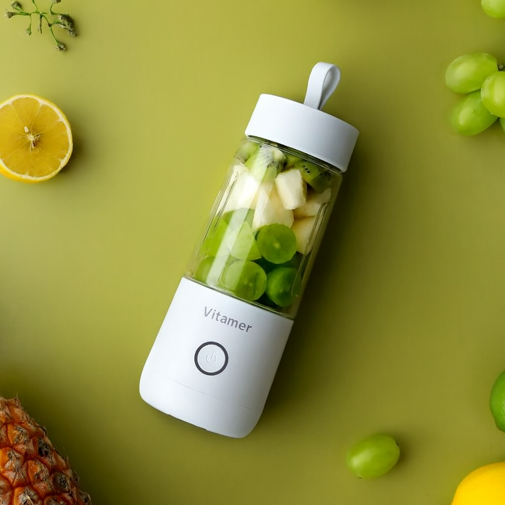 White Vitamer blender with fruit slices inside