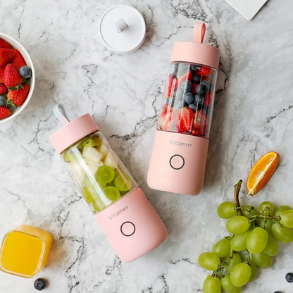 Two Vitamer portable blenders, Pink and White