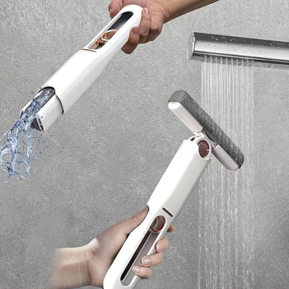 Two hands using a compact cleaning tool one rinsing it under water, the other wiping a wet surface.