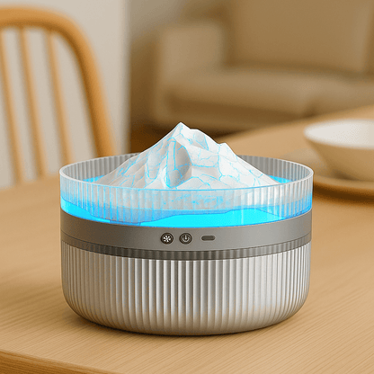 Snow mountain LED aroma diffuser on dining table with blue light