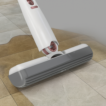 Compact self-squeeze mini mop cleaning the floor.