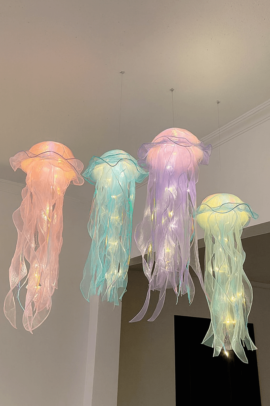 Jellyfish mood lamp creating soothing underwater light effect for room décor