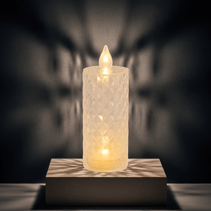 Rose Pattern LED Candle Light creating cozy warm glow on dark tabletop background