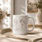 Mother & Daughter Coffee Mug featuring a heartwarming illustration of a mother and daughter enjoying tea together.