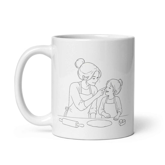 Mother & Daughter Coffee Mug featuring a sketch of a mom and daughter baking together.