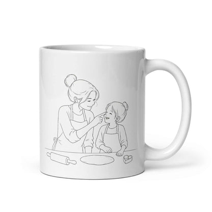 Mother & Daughter Coffee Mug featuring a drawing of a mom and daughter baking together.