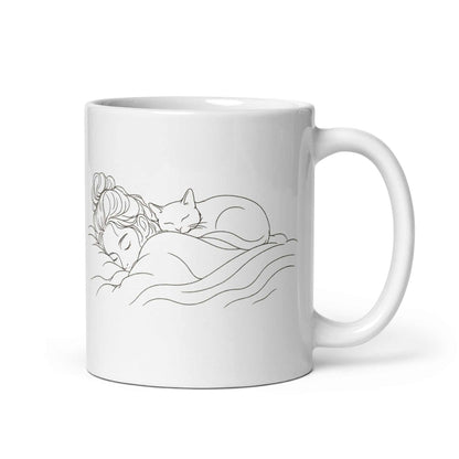 Cat Lover Coffee Mug featuring a serene design of a woman and a cat peacefully sleeping together.
